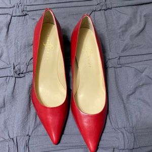New w/o tags, red Ivanka Trump heels. Never worn. I do not have a box for these.